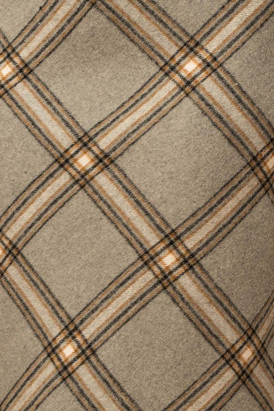 The Penny Plaid Skirt is a truly timeless piece – crafted with a unique grey plaid design and bias cut, it offers an elegant, yet versatile appearance that adds sophisticated depth to any wardrobe. Its midi length complements a variety of styles for effortless look.