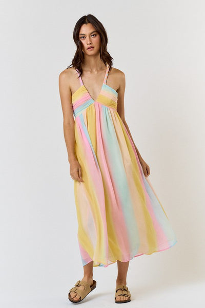 <p data-mce-fragment="1">Express your playful side with our Rainbow Maxi Dress. This dress features pastel stripes and a braided halter design, perfect for a fun and stylish look. Embrace the vibrant colors and make a statement wherever you go.</p> <p data-mce-fragment="1">Product Features:</p> <ul> <li>100% Polyester</li> <li>Lined</li> </ul>