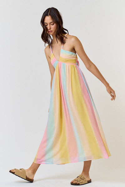 <p data-mce-fragment="1">Express your playful side with our Rainbow Maxi Dress. This dress features pastel stripes and a braided halter design, perfect for a fun and stylish look. Embrace the vibrant colors and make a statement wherever you go.</p> <p data-mce-fragment="1">Product Features:</p> <ul> <li>100% Polyester</li> <li>Lined</li> </ul>