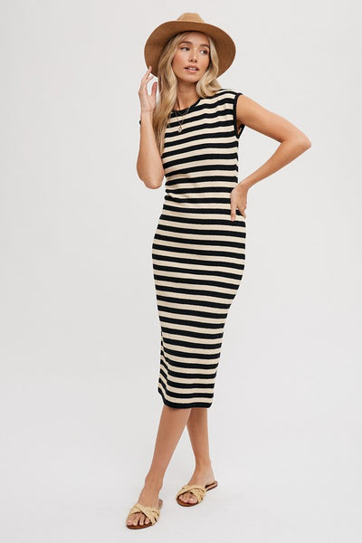 Our Striped Tank Midi Dress is the must have dress of the summer! This chic dress features a unique blend of contrasting stripe patterns in bold, complementary black and cream colors. The sleeveless tank-style top creates a vibrant yet sophisticated look, while the elegant midi length makes it perfect for any occasion. . Product Features: 41% Acrylic, 37% Cotton, 22% Nylon Sleeveless Midi length