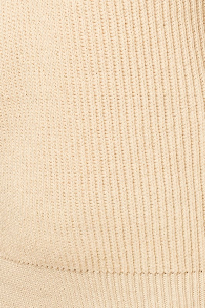 Our classic V-Neck Power Shoulder Sweater Vest is ready to take you from day to night. Crafted with soft knit fabric, this timeless ivory top is a perfect layering piece over your favorite button-down shirt with jeans or mini dress for an effortless, timeless style. Ready to be taken anywhere, this vest gives you the power to make a statement. Product Details: 50% Acrylic, 50% Polyester Ribbed V-neck