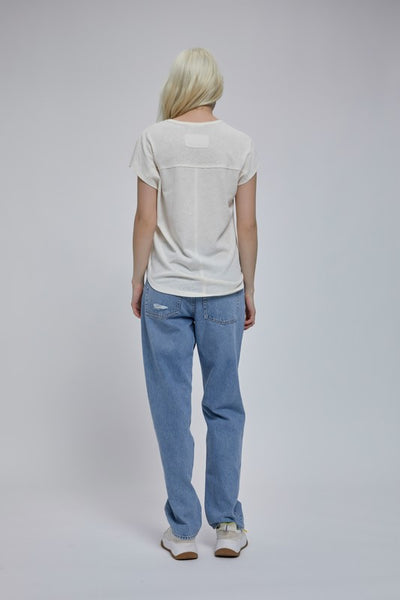 Who doesn't love a white tee! I know I always have one (or 10) in my closet! This classic white short sleeve t-shirt features a v-neckline and short cap sleeves. Product Details: 64% Rayon, 34% Polyester Raw edge stitch detailing V-neckline Cap sleeves Back yoke