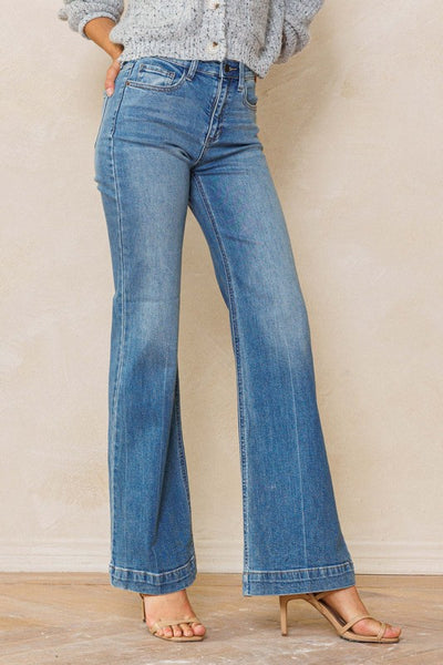 An easy, free-spirited style describes these slim wide leg jeans. Featuring a high rise and wide bottom hem. The medium vintage wash pairs well with all shades and wear over boots, flats or whatever! Product Details: Leg opening: 22" Front Rise: 10 1/2" Inseam: 33" Knee: 18 1/2" Bottom Hem: 1 1/2" 99% Cotton, 1% Spandex Five pockets Zipper fly with button closure High rise