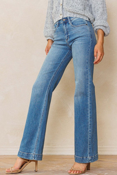 An easy, free-spirited style describes these slim wide leg jeans. Featuring a high rise and wide bottom hem. The medium vintage wash pairs well with all shades and wear over boots, flats or whatever! Product Details: Leg opening: 22" Front Rise: 10 1/2" Inseam: 33" Knee: 18 1/2" Bottom Hem: 1 1/2" 99% Cotton, 1% Spandex Five pockets Zipper fly with button closure High rise