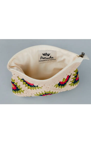 This on trend beige and multicolored crochet clutch is a must have! Featuring a beige lime green, navy and pink color palette. It's the perfect summer accessory! Product Details: Zip closure Fully lined Measures 9.5" x 7" x 1" 100% Cotton