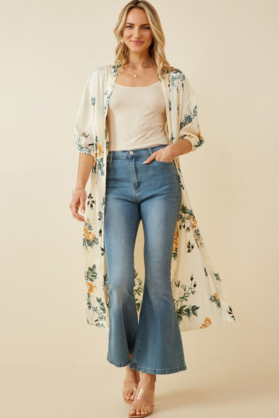 Absolutely stunning is a perfect description of this satin floral duster. Pair with a orange tank and wide leg jeans for the perfect look. Product Details: 100% Polyester Ivory floral woven fabric Open front Cuff Sleeve