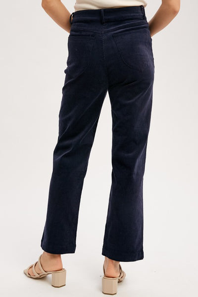 Classic cords blended with stretch equals a perfect pair of pants! Featuring a stunning midnight blue color with a straight leg ankle fit. You'll love these pants! Product Features: 97% Cotton, 3% Spandex Corduroy pant with stretch Straight ankle length Classic 5 pockets Button and hidden zipper closure Belt loops Model is 5'8" and is wearing a small