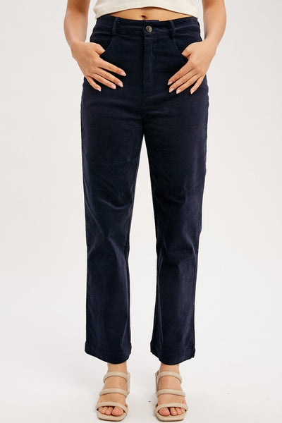 Classic cords blended with stretch equals a perfect pair of pants! Featuring a stunning midnight blue color with a straight leg ankle fit. You'll love these pants! Product Features: 97% Cotton, 3% Spandex Corduroy pant with stretch Straight ankle length Classic 5 pockets Button and hidden zipper closure Belt loops Model is 5'8" and is wearing a small