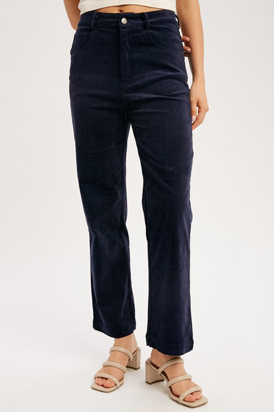 Classic cords blended with stretch equals a perfect pair of pants! Featuring a stunning midnight blue color with a straight leg ankle fit. You'll love these pants! Product Features: 97% Cotton, 3% Spandex Corduroy pant with stretch Straight ankle length Classic 5 pockets Button and hidden zipper closure Belt loops Model is 5'8" and is wearing a small