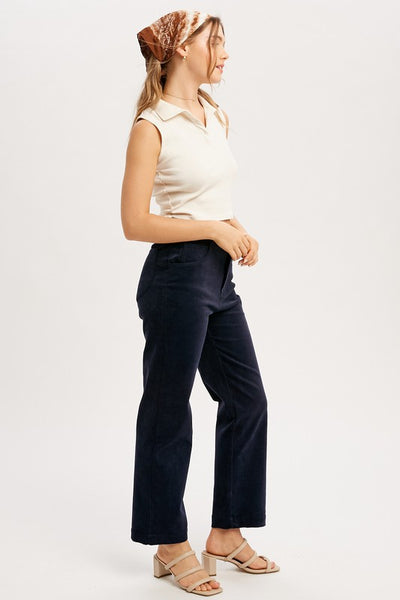 Classic cords blended with stretch equals a perfect pair of pants! Featuring a stunning midnight blue color with a straight leg ankle fit. You'll love these pants! Product Features: 97% Cotton, 3% Spandex Corduroy pant with stretch Straight ankle length Classic 5 pockets Button and hidden zipper closure Belt loops Model is 5'8" and is wearing a small