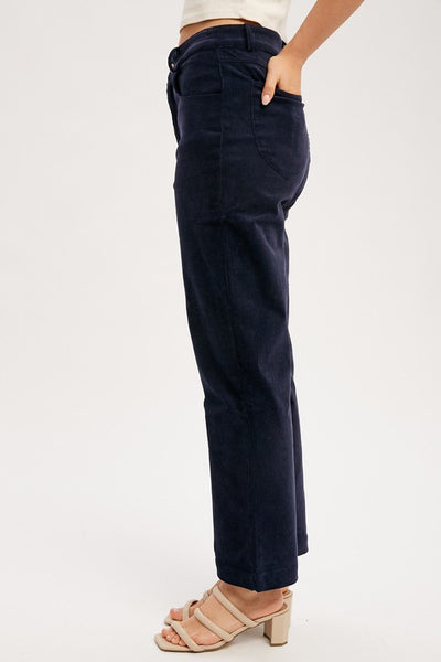 Classic cords blended with stretch equals a perfect pair of pants! Featuring a stunning midnight blue color with a straight leg ankle fit. You'll love these pants! Product Features: 97% Cotton, 3% Spandex Corduroy pant with stretch Straight ankle length Classic 5 pockets Button and hidden zipper closure Belt loops Model is 5'8" and is wearing a small