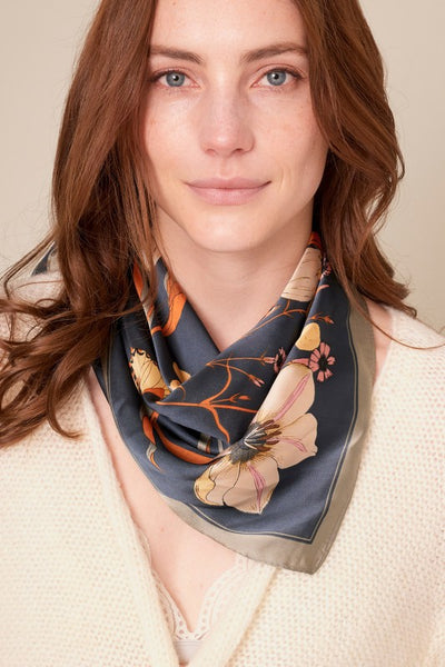 Stunning silky navy floral scarf. So many options of how to wear this scarf - around your neck as a bandana in your hair as a ponytail holder around your waist as a belt Product Details: Approximately 27.5" x 27.5" 100% Polyester