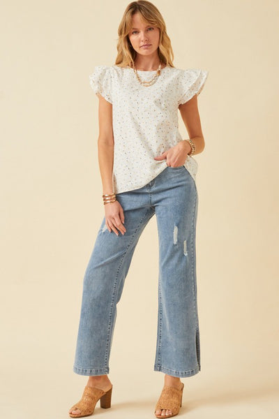 This ivory ditsy print eyelet top is so sweet. Featuring a luxe eyelet design that is oh-so feminine. With ruffle short sleeve design and back keyhole closure. Pair with your favorite jeans for an effortless warmer weather look. Product Details: 100% cotton Lined Ditsy woven fabric Round cut neckline Back keyhole closure