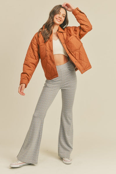 This roasted pecan quilted puffer jacket screams Fall! A perfect transitional piece featuring a boxy fit along with front patch pockets and snap front closure. An absolute essential this season! Product Features: 100% Nylon Lined Front patch pockets Snap button closure Long sleeves with snap button cuffs Shirttail hem Model is 5' 9" 32-24.5-34.5 and wearing a small