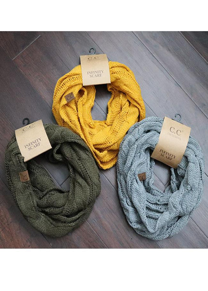 Stay cozy warm with this CC knit infinity scarf in three beautiful colors - grey, mustard and olive.