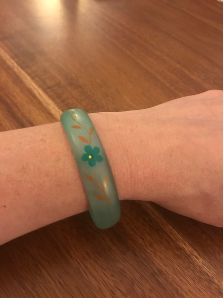 Gorgeous vintage lucite painted bangle bracelet. Width of bracelet is approximately 2 3/4".