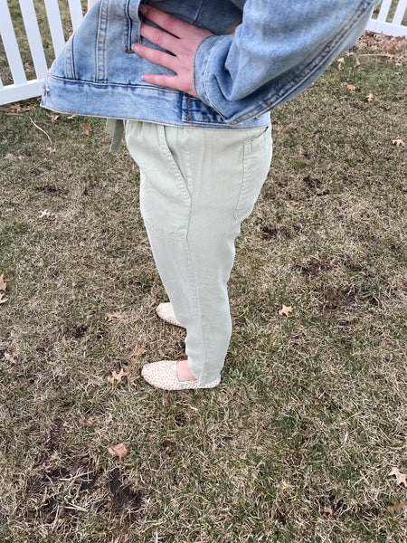 Get ready to experience the most comfortable, super soft sage tencel drawstring pants with pockets on both sides and back. Versatile and perfect to dress up or down. Elevate any look with our Sage Tencel Pants - an effortless blend of comfort, style, and convenience!