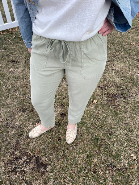 Get ready to experience the most comfortable, super soft sage tencel drawstring pants with pockets on both sides and back. Versatile and perfect to dress up or down. Elevate any look with our Sage Tencel Pants - an effortless blend of comfort, style, and convenience!
