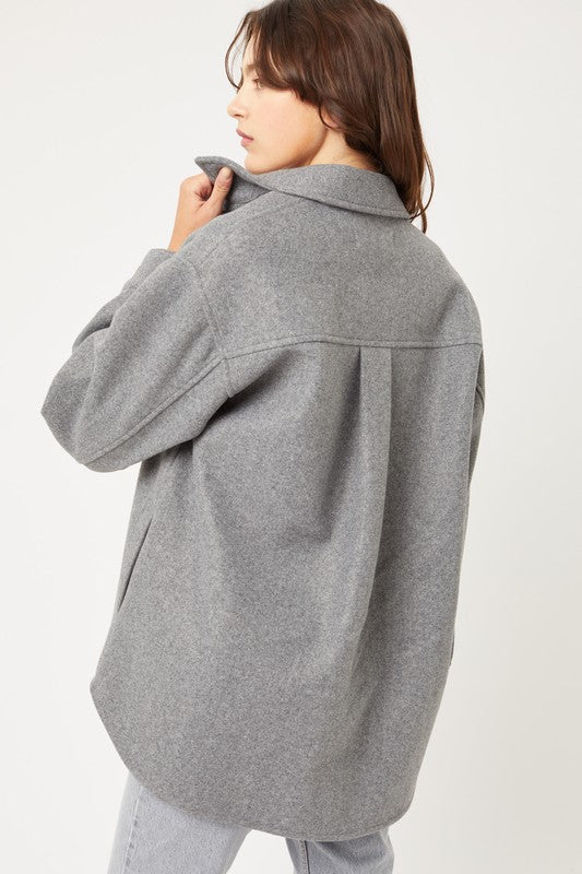 Stay cozy and look stylish in the Opal Oversized Fleece Shacket. This ultra-soft piece is made from fleece and designed to be oversized for added comfort. Enjoy the soft, brushed finish and full zip closure for ultimate versatility. With this shacket, you can look good and feel great on the chilliest of days. Is it time to upgrade your cold-weather wardrobe?