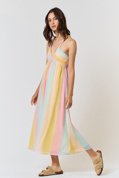 <p data-mce-fragment="1">Express your playful side with our Rainbow Maxi Dress. This dress features pastel stripes and a braided halter design, perfect for a fun and stylish look. Embrace the vibrant colors and make a statement wherever you go.</p> <p data-mce-fragment="1">Product Features:</p> <ul> <li>100% Polyester</li> <li>Lined</li> </ul>