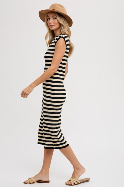 Our Striped Tank Midi Dress is the must have dress of the summer! This chic dress features a unique blend of contrasting stripe patterns in bold, complementary black and cream colors. The sleeveless tank-style top creates a vibrant yet sophisticated look, while the elegant midi length makes it perfect for any occasion. .  Product Features:  41% Acrylic, 37% Cotton, 22% Nylon Sleeveless Midi length