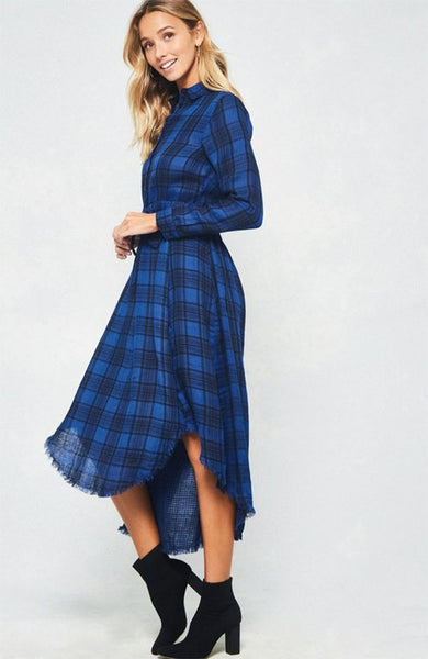 A blue and black plaid pattern shirt dress featuring basic collar, button front, self-tie waist, long sleeves and hi-lo hem. This dress is made with medium weight fabric that has very beautiful patterns.