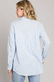 This easy breezy relaxed fit button down shirt screams ocean view! The blue thin strips and light weight make it the perfect transition piece.   Tie it, button it up or leave it unbuttoned with a tank underneath, so many options of how to style this classic.   Product Details:  70% Rayon 30% Cotton Oversized fit Hits at the hips Light weight Button down top Think strips