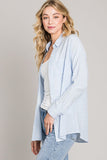 This easy breezy relaxed fit button down shirt screams ocean view! The blue thin strips and light weight make it the perfect transition piece.   Tie it, button it up or leave it unbuttoned with a tank underneath, so many options of how to style this classic.   Product Details:  70% Rayon 30% Cotton Oversized fit Hits at the hips Light weight Button down top Think strips