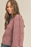 How cute is this mauve chevron sweater. With 3/4 bell sleeves and scalloped cuffs, you'll definitely fall in love with it.   Product Details:  Fabric - 70% Acrylic, 20% Polyester, 10% Spandex Shorter cropped style  3/4 bell sleeves Scalloped cuffs Ribbed crew neckline and hem Chevron knit design Model is 5' 9