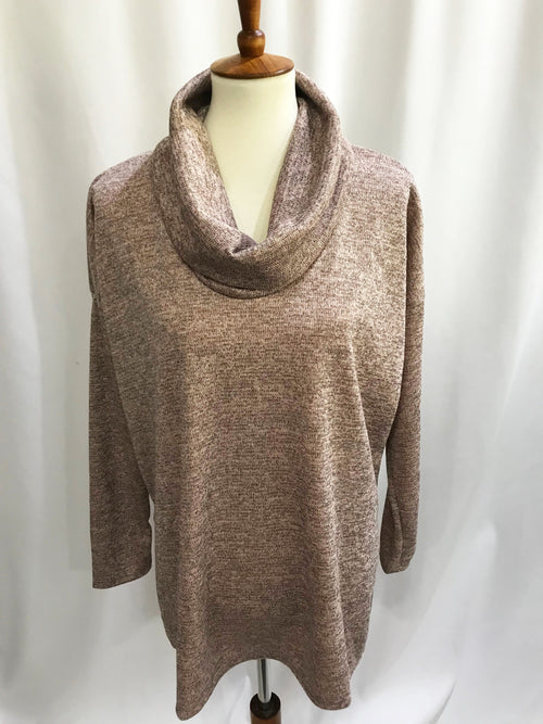This dark blush color knit top with a hint of sparkle is a great tunic length. It has a cowl neck and side slits with a loose fit. A perfect top to pair with leggings!