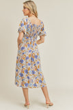 Sweeten up your look with this blue cream floral print midi dress. A versatile dress that can go from casual to dressy so easily. Featuring a sweetheart neckline and short puff sleeves. This dress is a must-have!  Product Details:  Sweetheart neckline More fitted bodice Short puff sleeves Side slit Smocked back