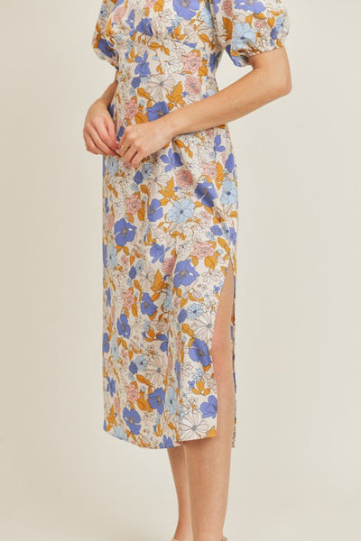 Sweeten up your look with this blue cream floral print midi dress. A versatile dress that can go from casual to dressy so easily. Featuring a sweetheart neckline and short puff sleeves. This dress is a must-have!  Product Details:  Sweetheart neckline More fitted bodice Short puff sleeves Side slit Smocked back