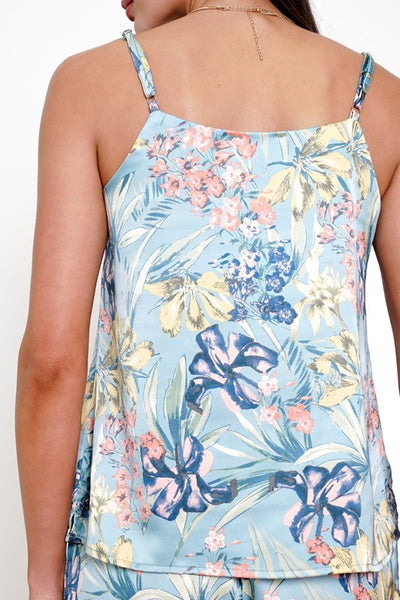 Our colorful botanical print camisole tank will be a luxurious addition to your summer wardrobe. It is so comfortable you'll never want to take it off! Team it with our matching satin wide leg pants or for a more casual direction pair with white jeans and flip flops.  Product details:  100% Polyester  Relaxed fit Adjustable straps