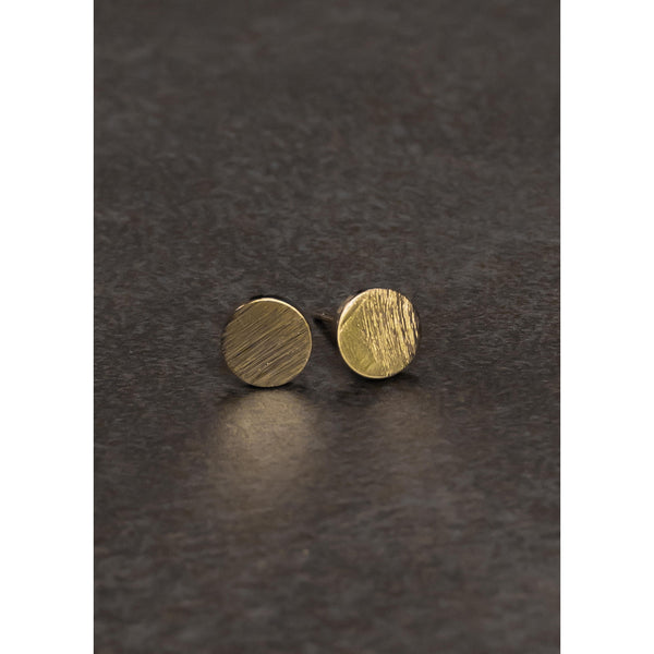 Simple and classic the perfect combination for your go to earrings. And this is the perfect description for these gold flat circle stud earrings.   Product Details:  Approximately .25" in size Lead and nickel free
