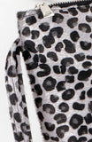 Grey leopard faux fur clutch with wrist strap