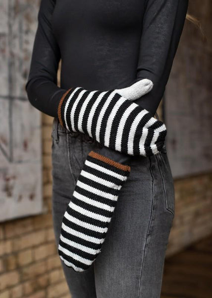 Keep your hands warm this winter with these grey and black striped fleeced lined mittens. The perfect color combo to pair perfectly with all your winter coats.   Product Details:  Fleece lined