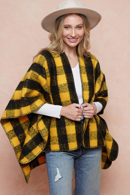Where are my Iowa Hawkeye Fans?!?!? This black and yellow checker plaid shawl screams I'm a fan. If not an Iowa fan, this buffalo plaid is still fun and on trend!   Product Details:  100% Acrylic Stitched edge Heavy sweater material Shawl/wrap 