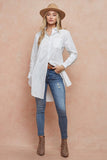 We love the ease of this white button down tunic shirt. Simple, classic style that works great with leggings or jeans.   Product Details:  100% Cotton  Length 37