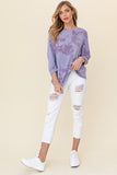 This lavender tie dye top is as lovely as a lilac in Spring. The on trend lavender color will be a perfect fit to style with summer whites. It's a must have!  Product Details  3/4 sleeve Round neck Model is wearing a small