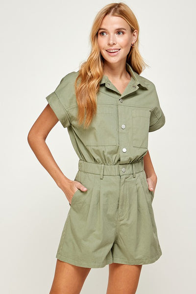 The cutest season transitional outfit is here! This sage green utility style romper will become your Spring/Summer go to piece!  Product Details:  Rolled sleeve detailing Front button down  Back pockets