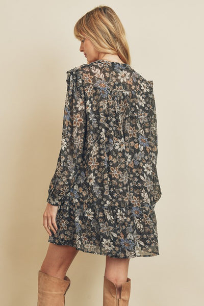 How cute is this black paisley floral print swing dress with long sleeves. There is a tasseled string detail on the neckline and ruffle detailing on the shoulders.  Product Detail:  100% Polyester Loose fit Fully lined Model is 5'9" and wearing size Small.
