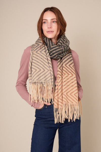 This beautiful chevron oblong scarf will set you apart in a crowd! With a gradient color palette of blacks, greys and browns.  Product Details:  Approximately 27.5" wide and 71" long 100% Polyester