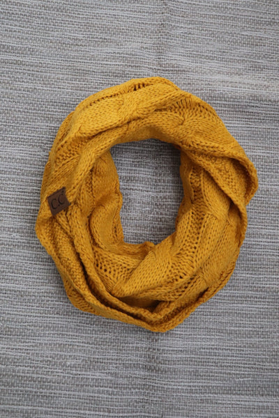 Stay cozy warm with this CC knit infinity scarf in three beautiful colors - grey, mustard and olive. 