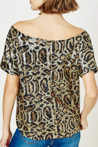 WOW - that's what you'll hear wearing this stunning top. The leopard print sequin is fabulous plus the off the shoulder neckline is a perfect fit. This top looks great with a skirt or with a pair of your favorite jeans. It will add a bit of fun and sparkle to your outfit.