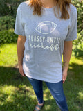 Here's the perfect tailgate top! It will definitely start some interesting conversations - Classy Until Kickoff!!   Product Details:  Unisex Cut - Bella + Canvas Heather Grey and Black Hand screen printed in the US Cotton/Poly blend